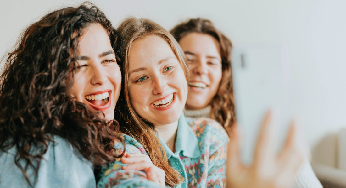 three women smiling